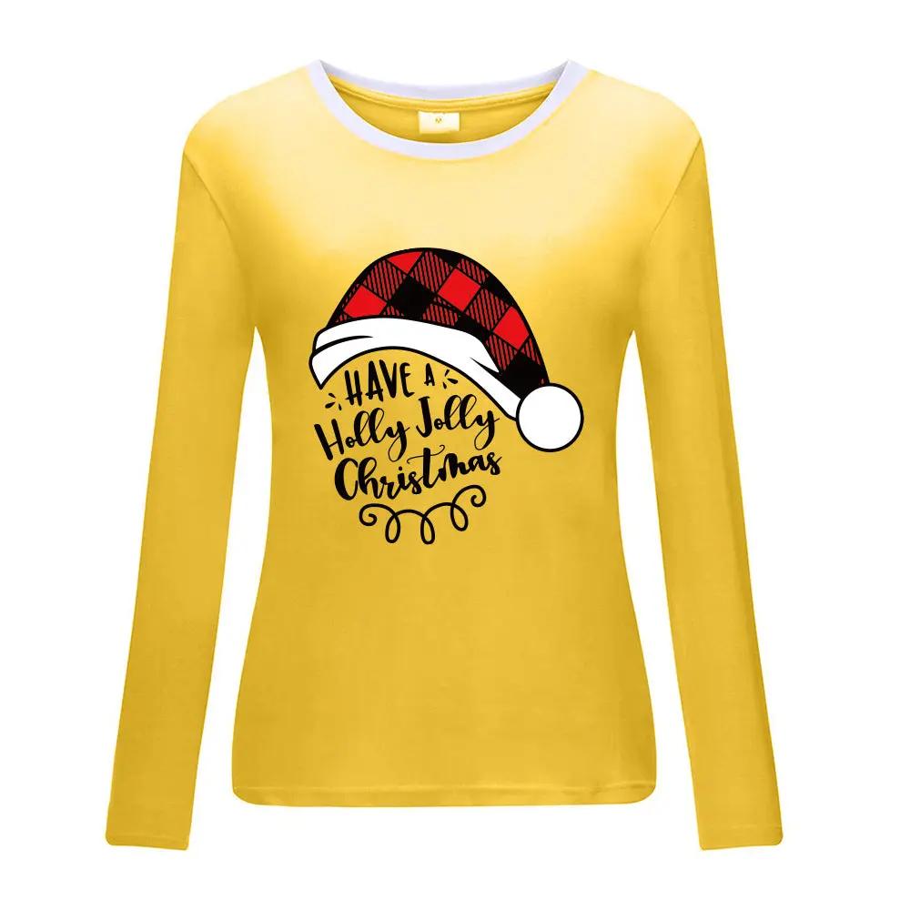 Yellow Christmas hat print white border long sleeved shirt with festive message, fun and bright holiday apparel option.