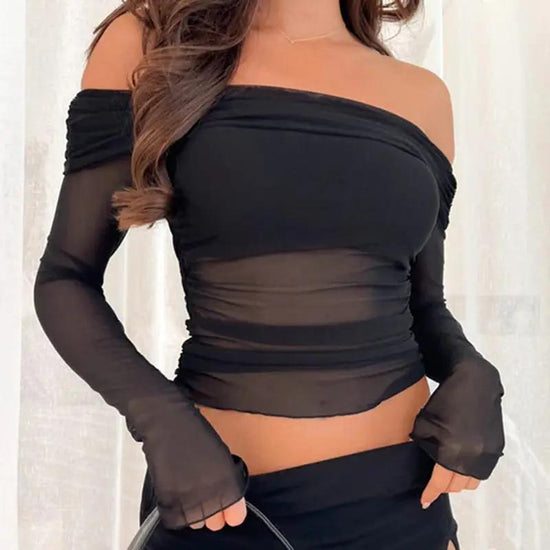 One shoulder slim fit mesh see through long sleeved short top in black, styled with ruched detail and sheer sleeves for a trendy casual look.